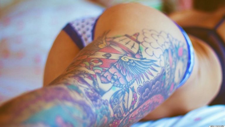 Girl With Full Leg Tattoo