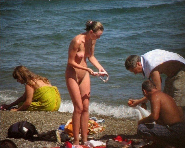 Girls Changing Clothes On Beach