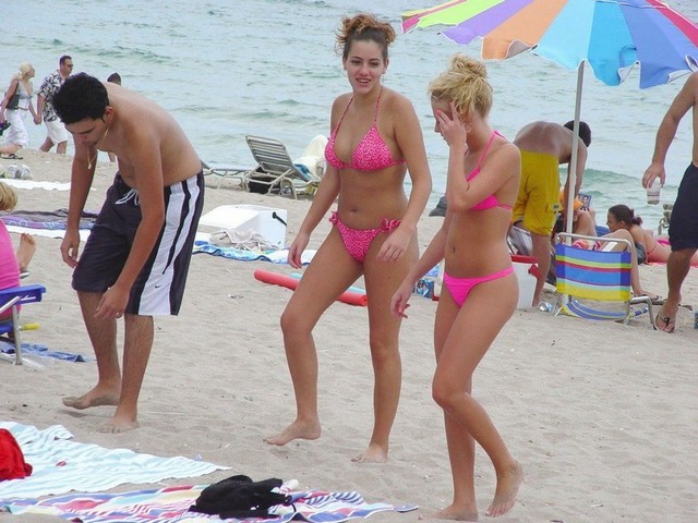 Pink Bikini Babes Walking On Hot Beach Sands Pink Bikini Babes Walking On Hot Beach Sands